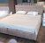 Discount Iris 180x200 bed with high legs and a niche for linen - buy in Blest